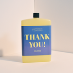 Bottle of Letterbox Cocktails with 'Thank You! Oliver' text on a light background