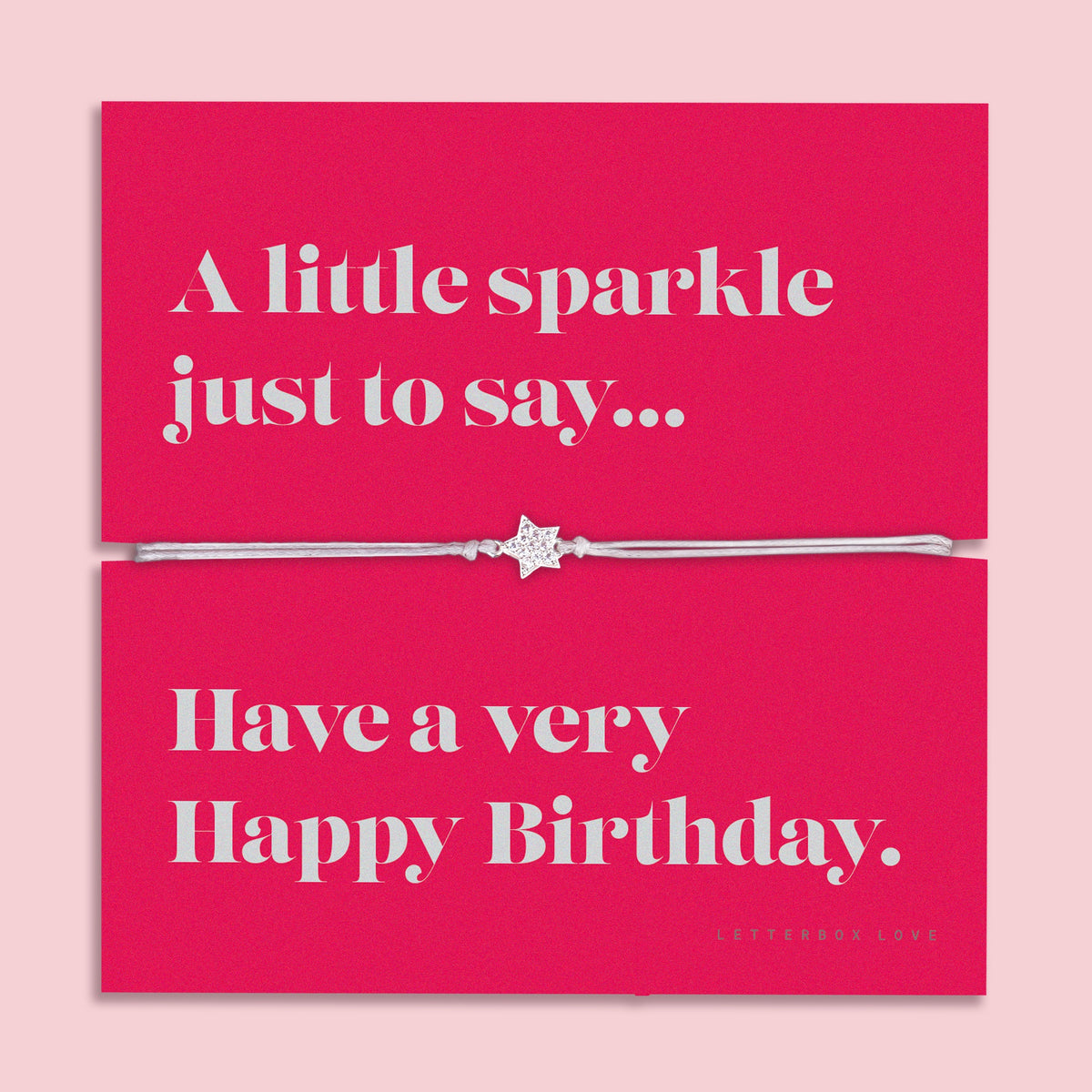 Silver bracelet on a pink card with birthday message