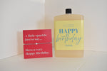 Bottle of letterbox cocktails with a happy birthday bracelet and personalised happy birthday cocktail on a white background