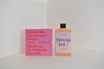 Bottle of letterbox cocktails with a pink thank you bracelet and thank you cocktail on a white background